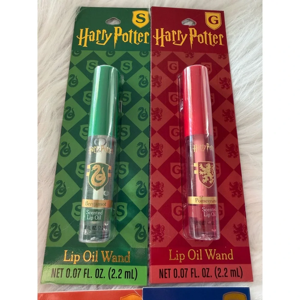Harry Potter Hogwarts House Scented Lip Oil Wand Set 4 Pack Bergamot Vanilla NIB